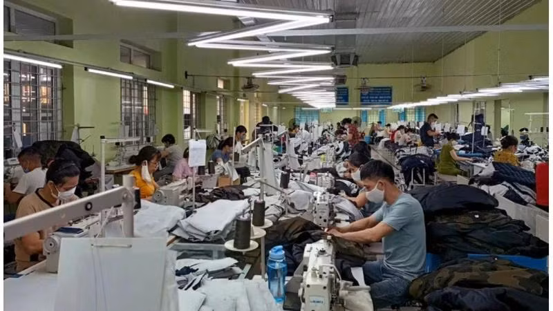 Sản xuất hàng dệt may tại Tổng công ty cổ phần Dệt may Nam Ðịnh. (Ảnh: Minh Đức)
