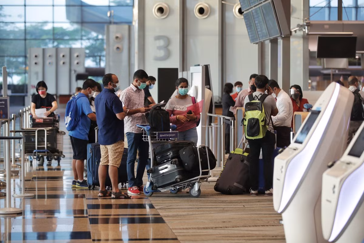 Singapore thắt chặt hạn chế với người nhập cảnh vào nước này. Ảnh: Strait Times.
