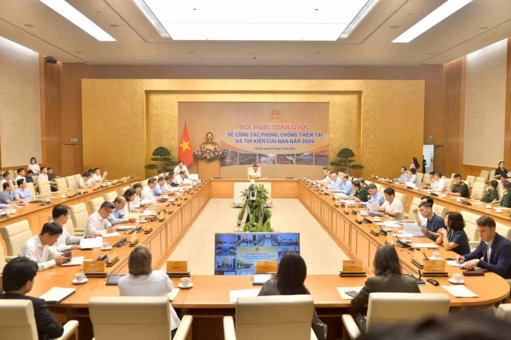 Các đại biểu tham dự Hội nghị tại đầu cầu Hà Nội. (ảnh báo Biên phòng)
