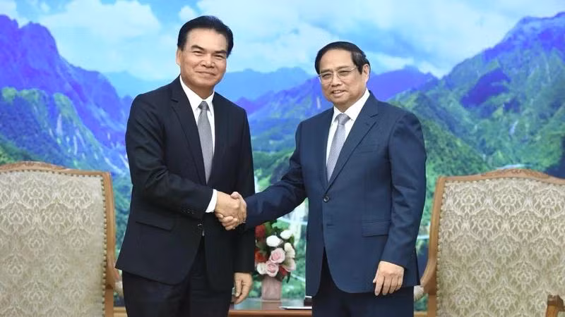 Thủ tướng Phạm Minh Chính tiếp Bộ trưởng Kế hoạch và Đầu tư Lào, Chủ tịch Ủy ban hợp tác Lào-Việt Nam Phet Phomphiphak (Ảnh: Trần Hải).