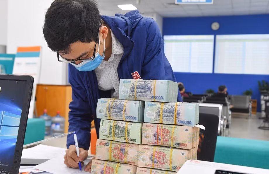 Tiền thưởng Tết là khoản thu nhập phải chịu thuế TNCN. Ảnh: Nam Khánh.