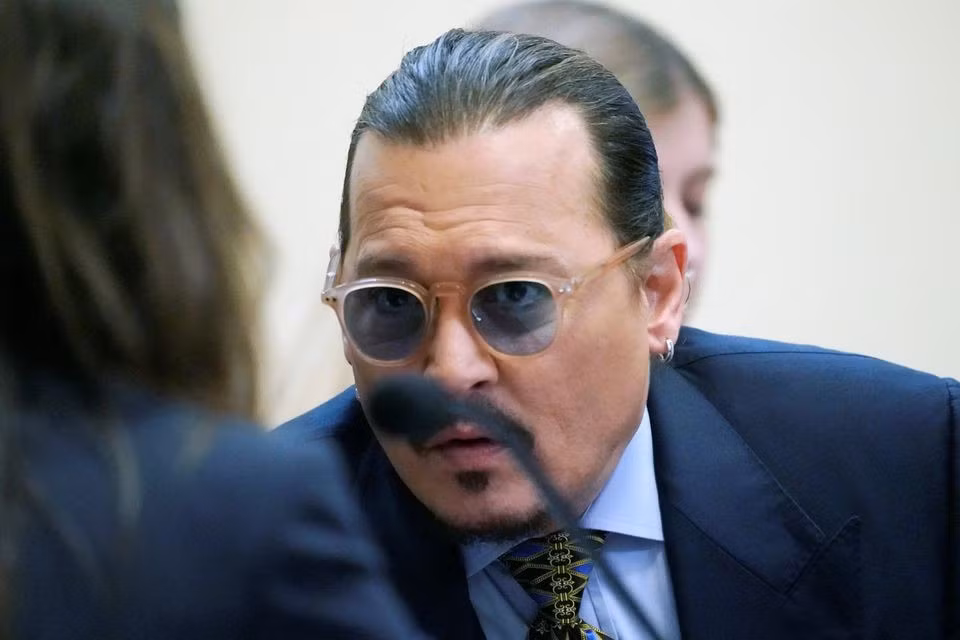 Depp thắng vợ cũ trong vụ kiện phỉ báng. Ảnh: Reuters.
