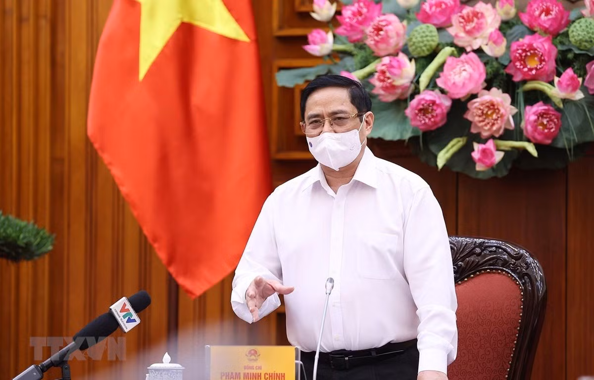 Thủ tướng Phạm Minh Chính yêu cầu thực hiện nghiêm túc các biện pháp phòng, chống dịch trong các khu công nghiệp. (Ảnh: Dương Giang/TTXVN)