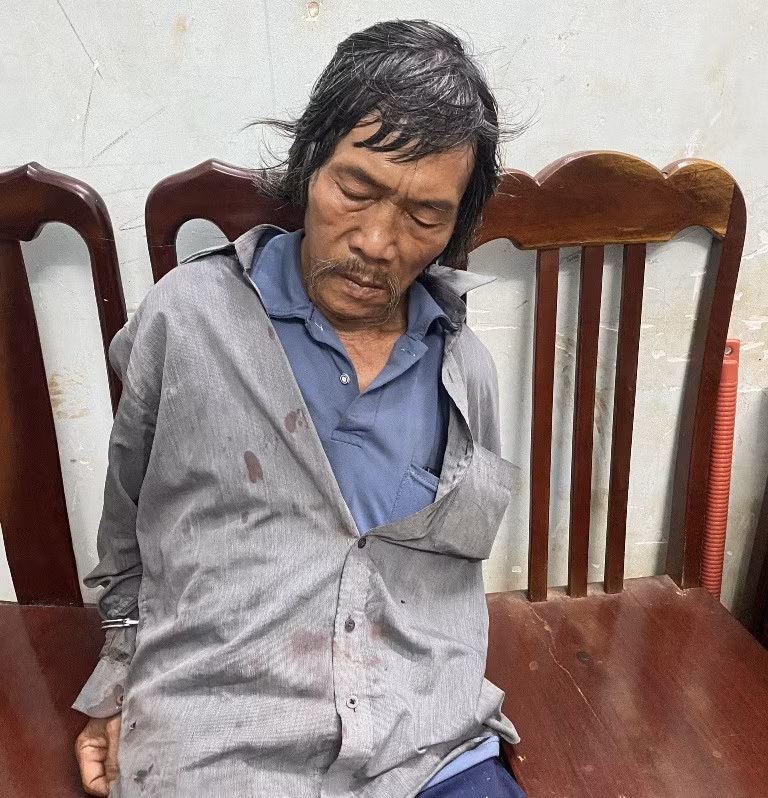 Nghi phạm Nguyễn Trang tại cơ quan công an