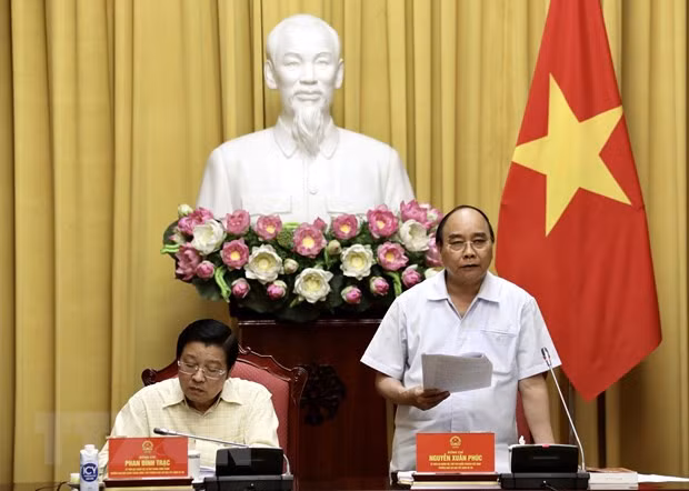 Chu tich nuoc chu tri lam viec ve De an xay dung Nha nuoc phap quyen hinh anh 1