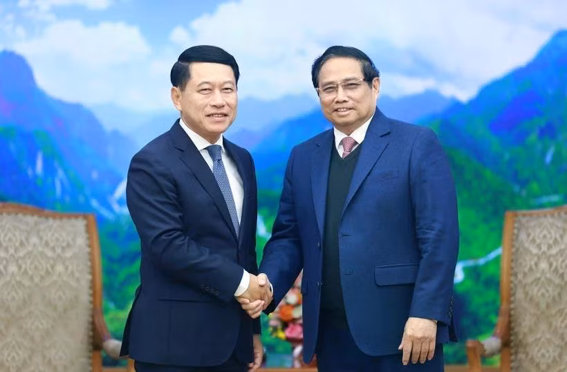 Thủ tướng Phạm Minh Chính tiếp Phó Thủ tướng, Bộ trưởng Ngoại giao Lào Saleumxay Kommasith. (Ảnh: Dương Giang/TTXVN)