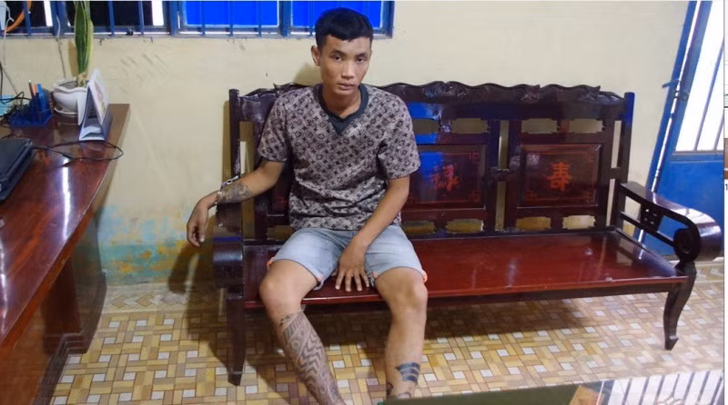 Hòa tại cơ quan điều tra.