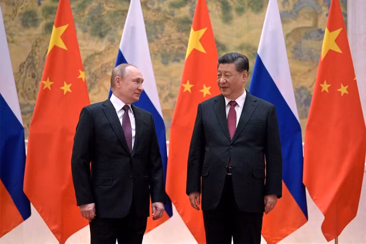 Chủ tịch Trung Quốc Tập Cận Bình (phải) tại một cuộc gặp với Tổng thống Nga Vladimir Putin ở Bắc Kinh hồi tháng 2/2022. Ảnh: Reuters