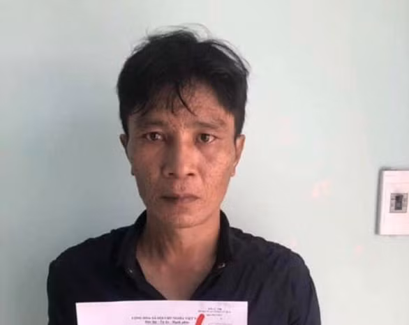 Nghi can gây ra vụ cướp ngân hàng bị bắt - Ảnh: C.A
