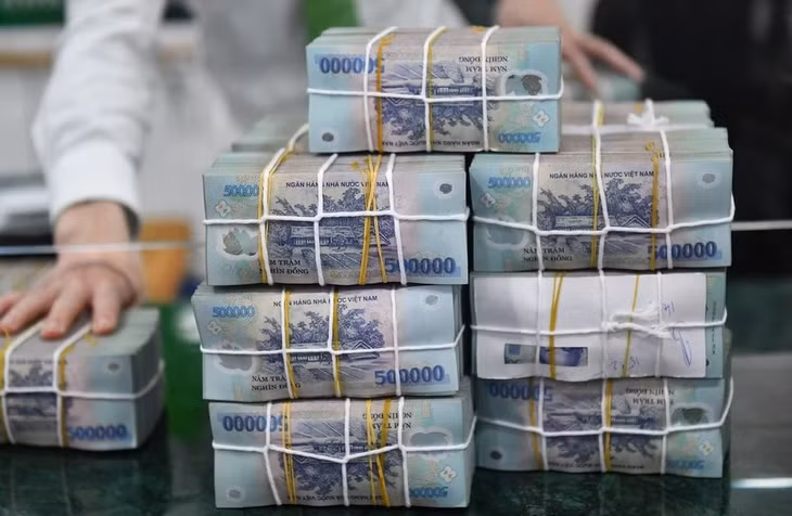 Dự báo tăng trưởng tín dụng cả năm khoảng 19-20% đồng nghĩa với việc ngành ngân hàng sẽ giải ngân cho vay ròng ra nền kinh tế khoảng 3,1 triệu tỷ đồng. Ảnh: Nam Khánh.