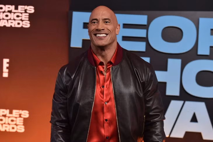 Dwayne Johnson ra mắt vai trò siêu anh hùng thành công. Ảnh: AP.