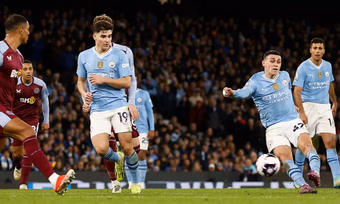 Cú sút giúp Foden lập hat-trick. Ảnh: Reuters