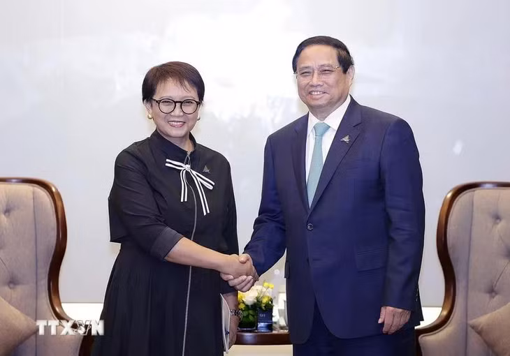 Thủ tướng Phạm Minh Chính tiếp Bộ trưởng Ngoại giao Indonesia Retno Marsudi. (Ảnh: Dương Giang/TTXVN)