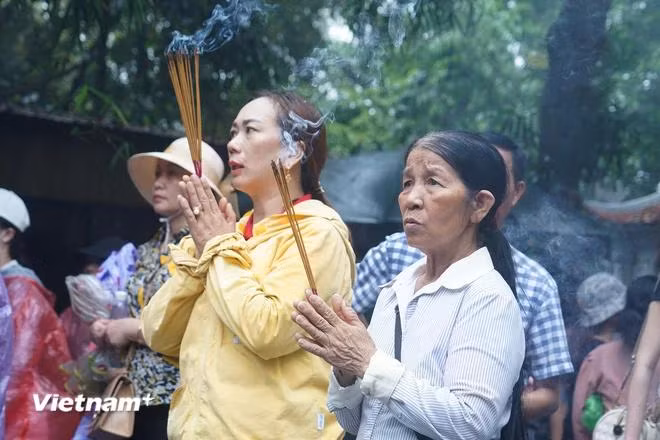 Với mỗi người dân Việt Nam, dù già hay trẻ, dù ở miền ngược hay miền xuôi, câu ca dao 'Dù ai đi ngược về xuôi, nhớ ngày Giỗ Tổ mùng 10/3' đã ăn sâu vào tiềm thức. (Ảnh: Việt Anh/Vietnam+)