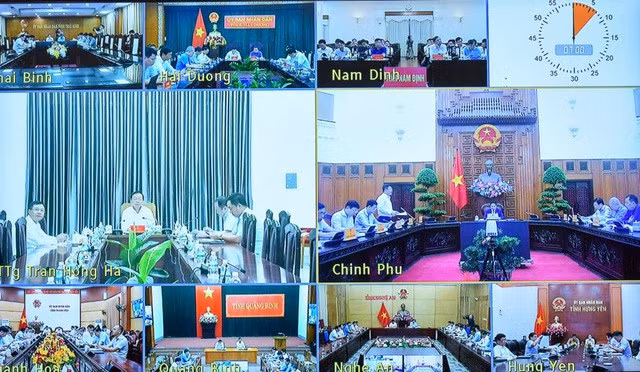Hội nghị được tổ chức theo hình thức trực tuyến tại điểm cầu trụ sở Chính phủ với điểm cầu 9 tỉnh có dự án đi qua - Ảnh: VGP/Nhật Bắc