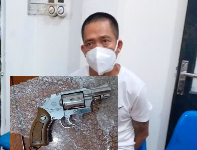 Đối tượng Nguyễn Quang Sơn và khẩu súng mang theo