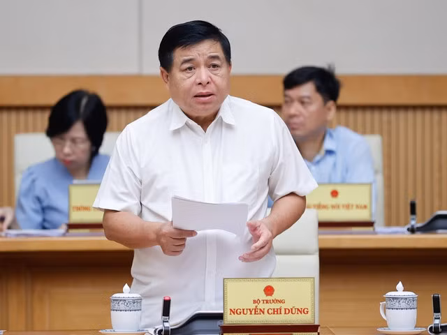 Bộ trưởng Bộ Kế hoạch và Đầu tư Nguyễn Chí Dũng phát biểu tại phiên họp - Ảnh: VGP/Nhật Bắc