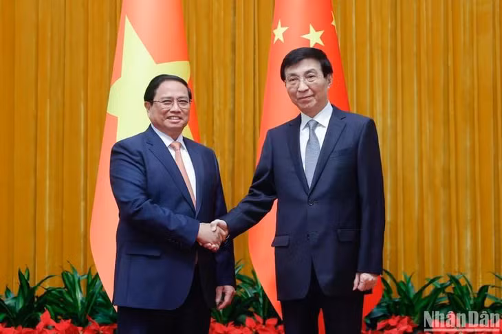 Thủ tướng Phạm Minh Chính hội kiến Chủ tịch Chính hiệp Trung Quốc Vương Hộ Ninh. (Ảnh: Nhật Bắc)