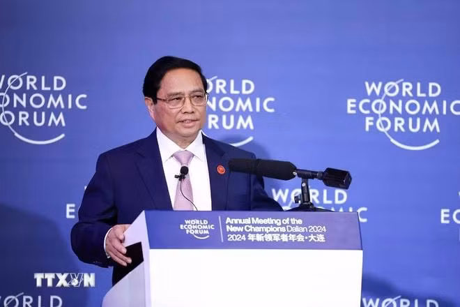 Thủ tướng Phạm Minh Chính đối thoại với lãnh đạo các tập đoàn lớn của WEF. (Ảnh: Dương Giang/TTXVN)