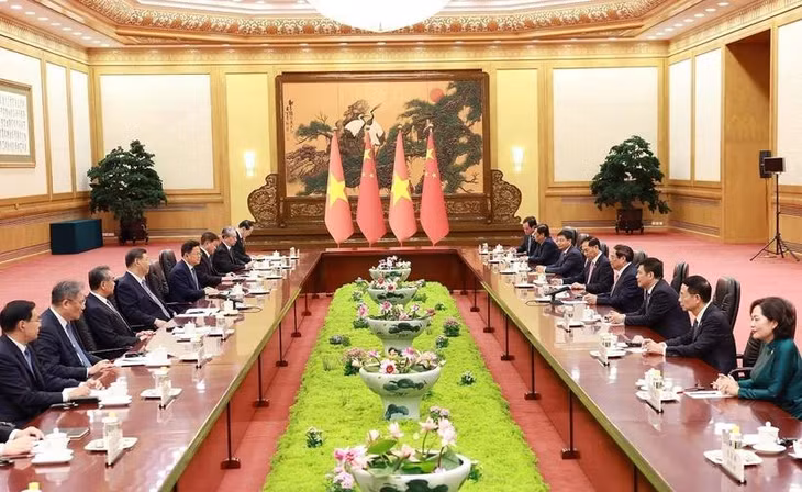 Thủ tướng Phạm Minh Chính hội kiến Tổng Bí thư, Chủ tịch Trung Quốc Tập Cận Bình. (Ảnh: Dương Giang/TTXVN)