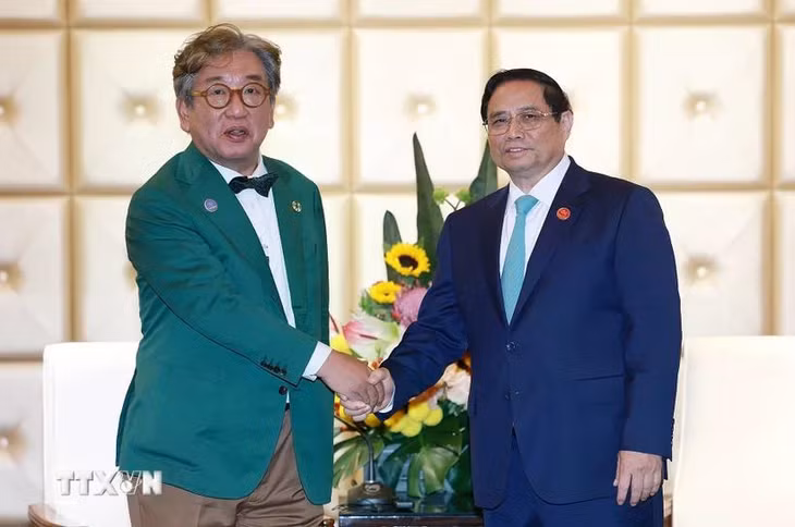 Thủ tướng Phạm Minh Chính tiếp Chủ tịch Ủy ban về Trung hoà Carbon và Tăng trưởng xanh Hàn Quốc Kim Sang-hyup. (Ảnh: Dương Giang/TTXVN)