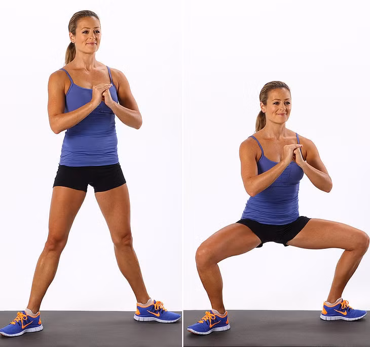 Circuit 1, Exercise 7: Sumo Squat | A 30-Minute, Calorie-Burning, Beginner Strength-Training Workout | POPSUGAR Fitness UK Photo 8