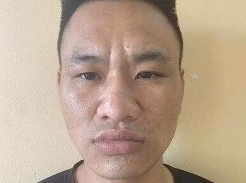 Bị can Nghiêm Viết Minh tại cơ quan công an.
