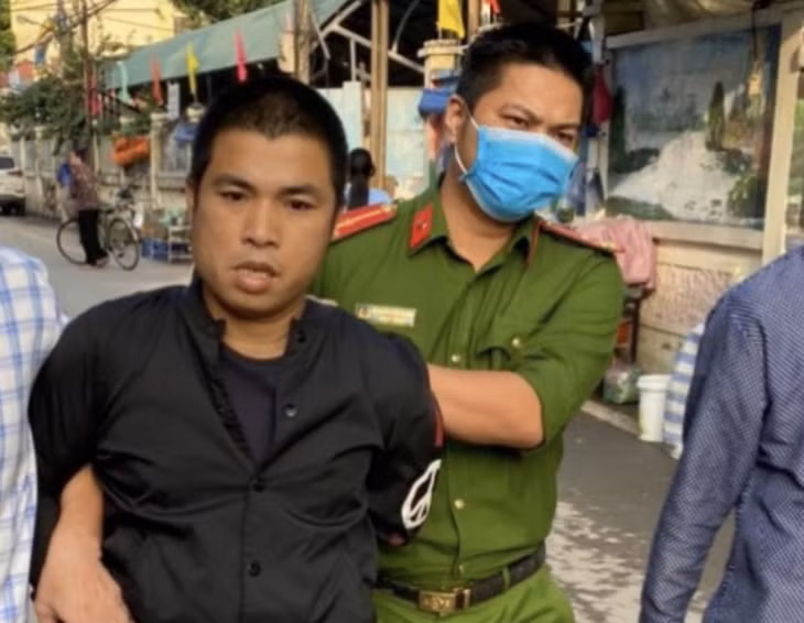 Nghi phạm Chiến bị cơ quan công an bắt giữ. Ảnh CAND