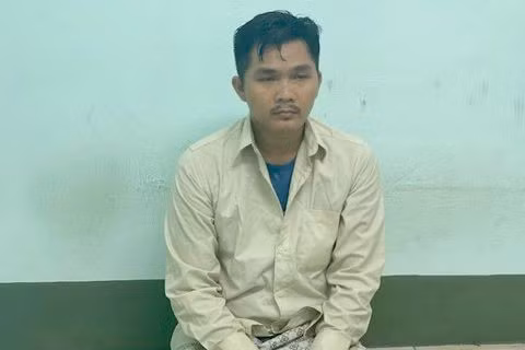 Ông Trần Xuân Tùng tại cơ quan công an.