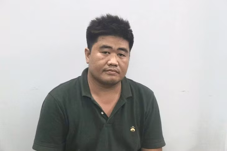 Nguyễn Lâm Minh Tuấn tại cơ quan công an - Ảnh: Công an cung cấp