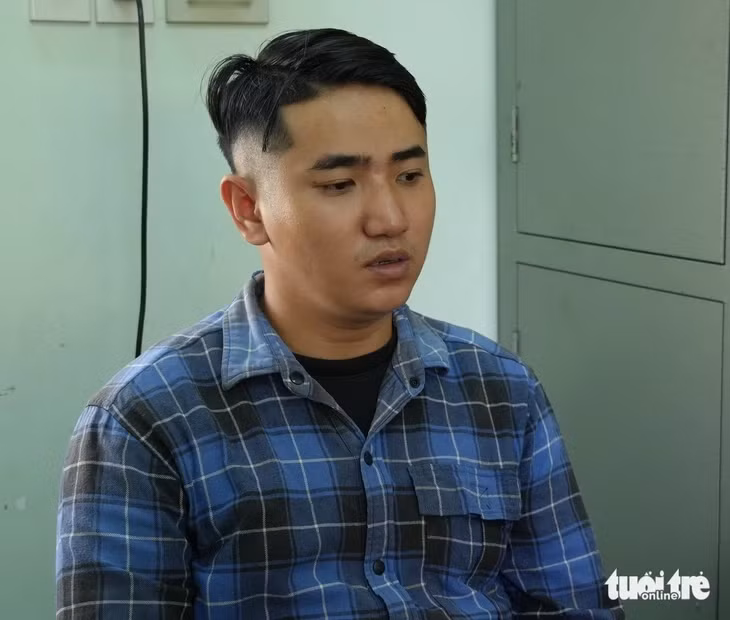 Lê Quan Trường Hải tại cơ quan công an - Ảnh: TRỌNG TÍN