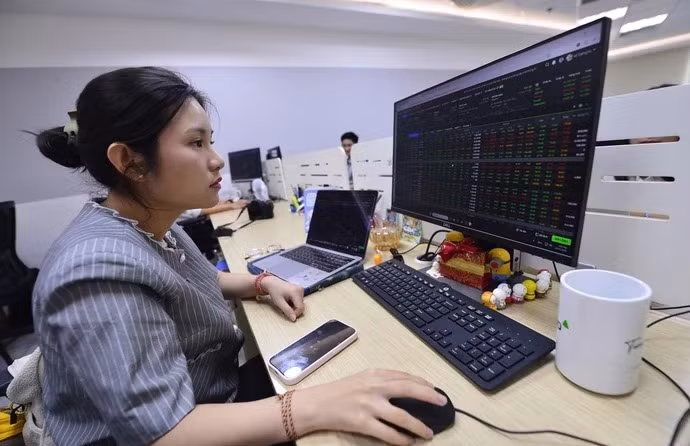 Chứng khoán vừa trải qua một tháng tăng mạnh nhất trong vòng 5 năm - Ảnh: QUANG ĐỊNH