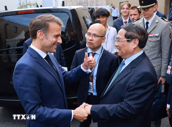 Thủ tướng Phạm Minh Chính hội kiến Tổng thống Pháp Emmanuel Macron. (Ảnh: Dương Giang/TTXVN)