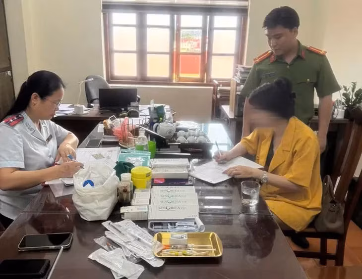 Nông Thị Soan làm việc với lực lượng chức năng. (Ảnh: CAND)