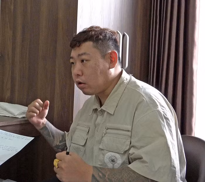 Đối tượng Hong Sangwoo làm việc với cơ quan Công an.