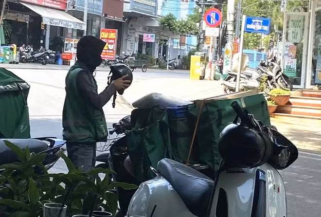 Tài xế xe ôm công nghệ cần cảnh giác với thủ đoạn của các đối tượng phạm tội cướp tài sản. Ảnh: Thanh Tuấn