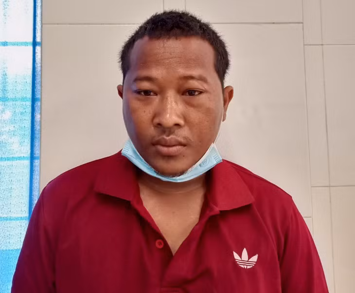 Hung thủ Mấu Điện sau khi bị bắt giữ. Ảnh: Hữu Toàn