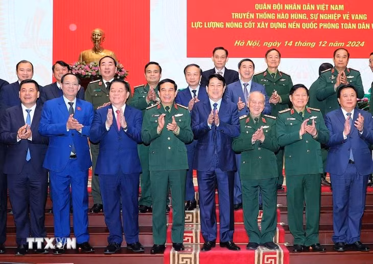 Chủ tịch nước Lương Cường và các đại biểu dự hội thảo. (Ảnh: Trọng Đức/TTXVN)
