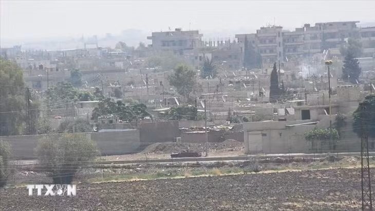 Khói bốc lên trong cuộc giao tranh tại Syria. (Ảnh: AA/TTXVN)