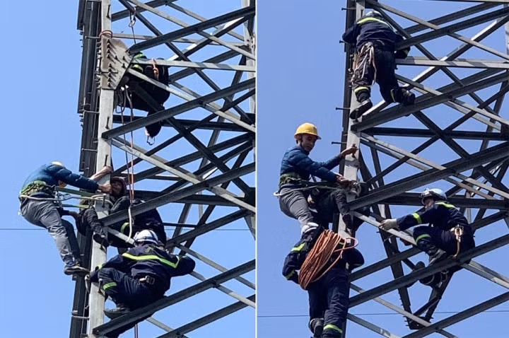 Lực lượng Cảnh sát PCCC&amp;CNCH đưa người phụ nữ xuống đất an toàn. (Ảnh: Công an cung cấp)