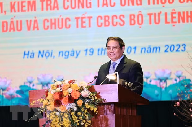 Thu tuong kiem tra, chuc Tet luc luong Cong an va Quoc phong truc Tet hinh anh 1