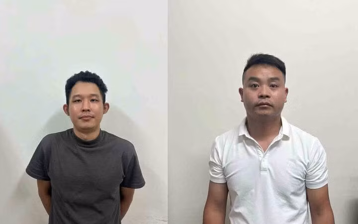 Hai người đàn ông nước ngoài bị bắt vì hành vi chiếm đoạt tài sản. (Ảnh: C.A)
