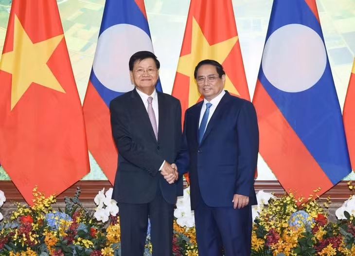 Thủ tướng Phạm Minh Chính và Tổng Bí thư, Chủ tịch nước Lào Thongloun Sisoulith. (Ảnh: THANH GIANG)