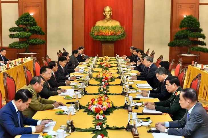 Cuộc gặp cấp cao giữa Đảng Cộng sản Việt Nam và Đảng Nhân dân Cách mạng Lào tại Thủ đô Hà Nội. (Ảnh: ĐĂNG KHOA)