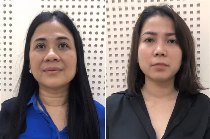 Giám đốc Xuyên Việt Oil Mai Thị Hồng Hạnh (trái) và phó giám đốc Nguyễn Thị Như Phương - Ảnh: BỘ CÔNG AN