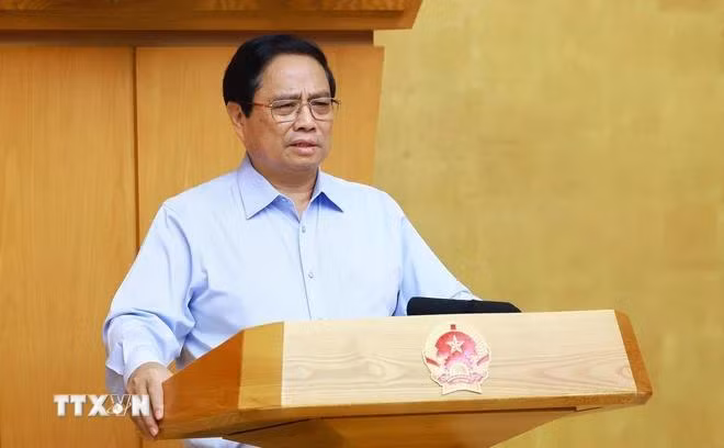 Thủ tướng Phạm Minh Chính chủ trì Phiên họp Chính phủ chuyên đề pháp luật. (Ảnh: Dương Giang/TTXVN)
