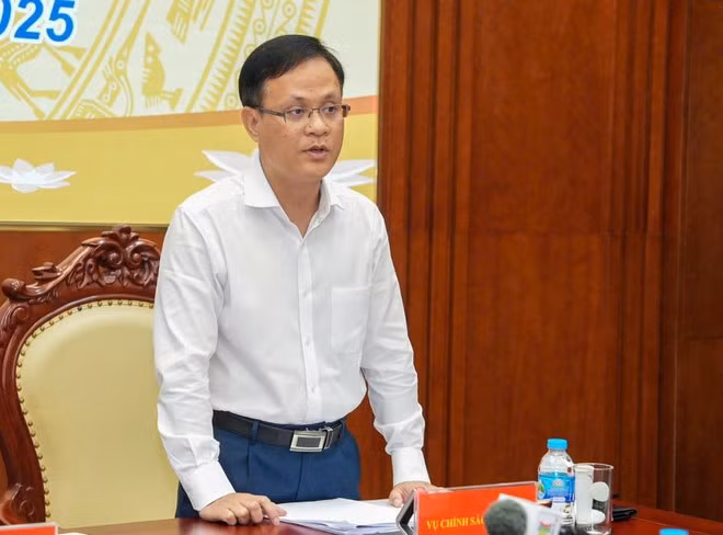 Ông Phạm Chí Quang, Vụ trưởng Vụ Chính sách tiền tệ tại buổi họp báo. (Ảnh: Vietnam+)