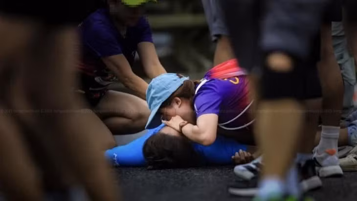 Bà P. bị đột quỵ và tử vong sau khi tham gia một giải chạy marathon được tổ chức ở TP Huế sáng 6-4 - Ảnh: HỒ NGỌC TUẤN