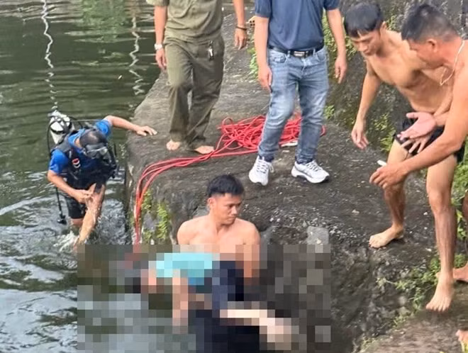Đội Chữa cháy và cứu nạn cứu hộ khu vực 5 tìm thấy thi thể bé trai 5 tuổi bị đuối nước và đưa lên bờ. Ảnh: M.C