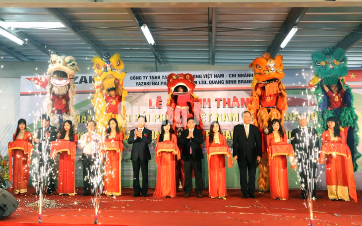 Khánh thành Nhà máy sản xuất hệ thống dây dẫn và các cụm thiết bị điện ô tô tại KCN Đông Mai (21-3-2015). Ảnh: Thu Trang